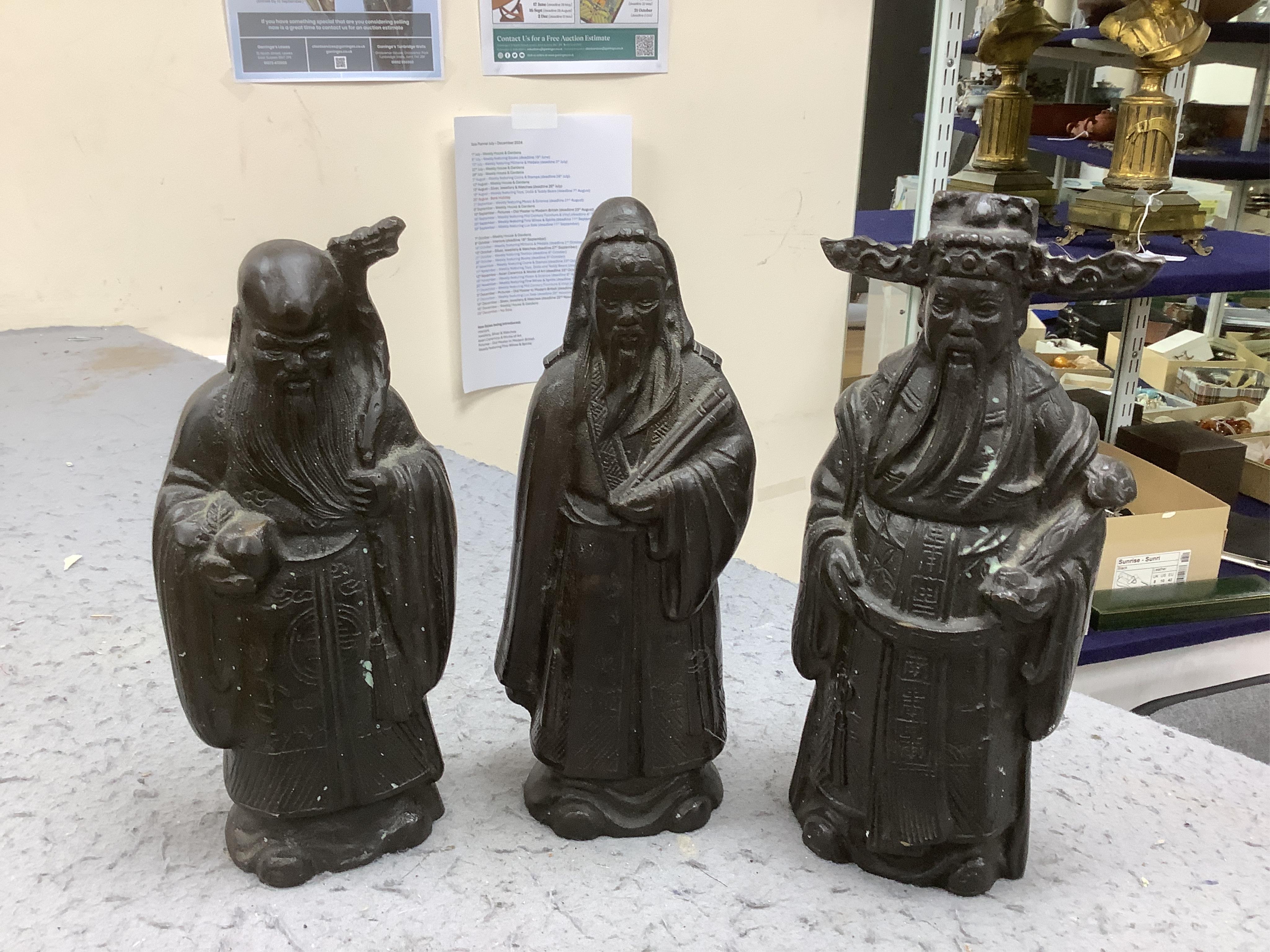 A group of Chinese bronzes and wood carvings, tallest 23.5cm. Condition - fair to good